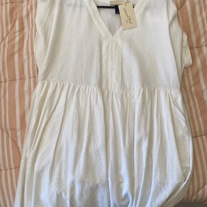 White linen dress with pockets